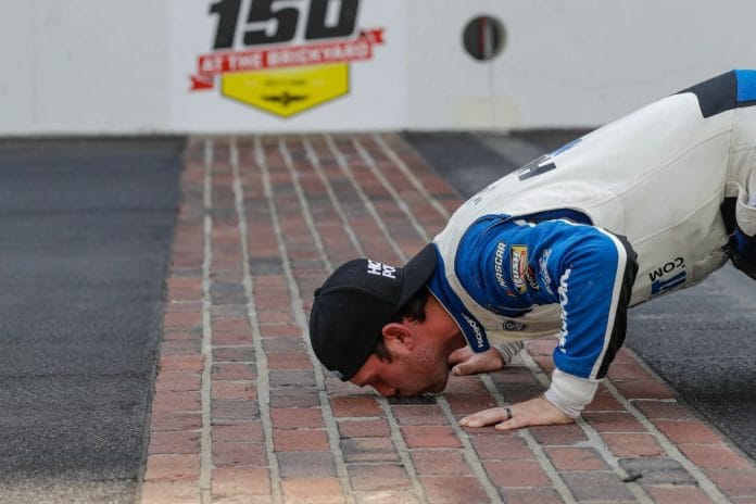 Tradition of Kissing the Bricks at IMS