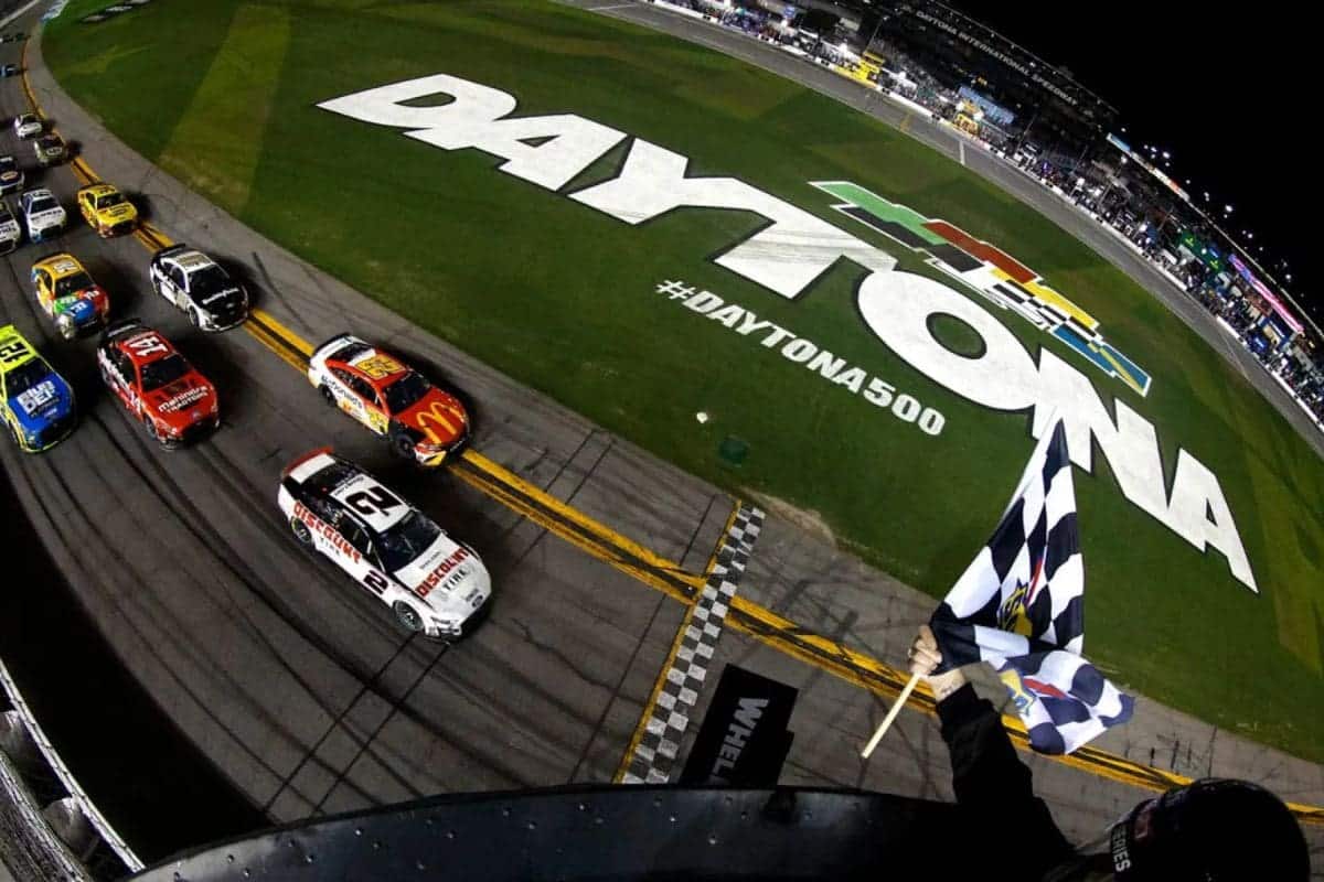 Olympic Gold Medalist Waves Green Flag at Daytona 2