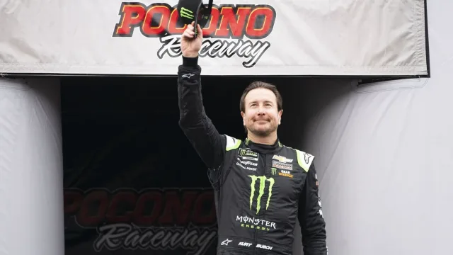 Kyle Busch reacts to Kurt Busch NASCAR Hall of Fame induction