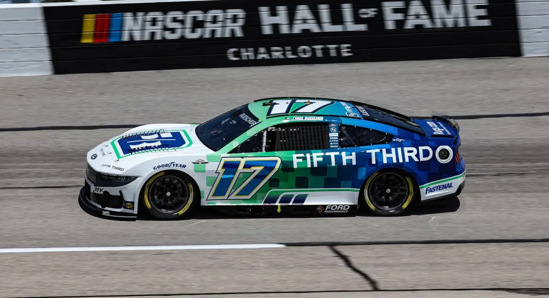 Chris Buescher autographs Daytona-winning car bumper in Michigan