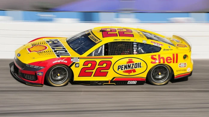 Joey Logano near victory in race